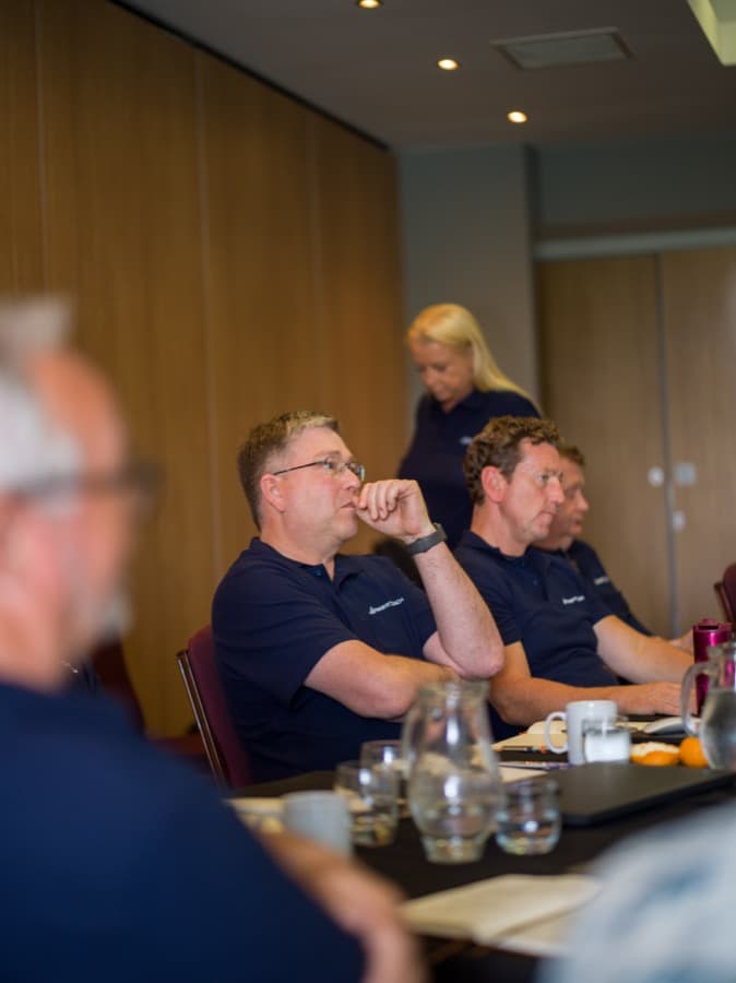 Members listening during a session